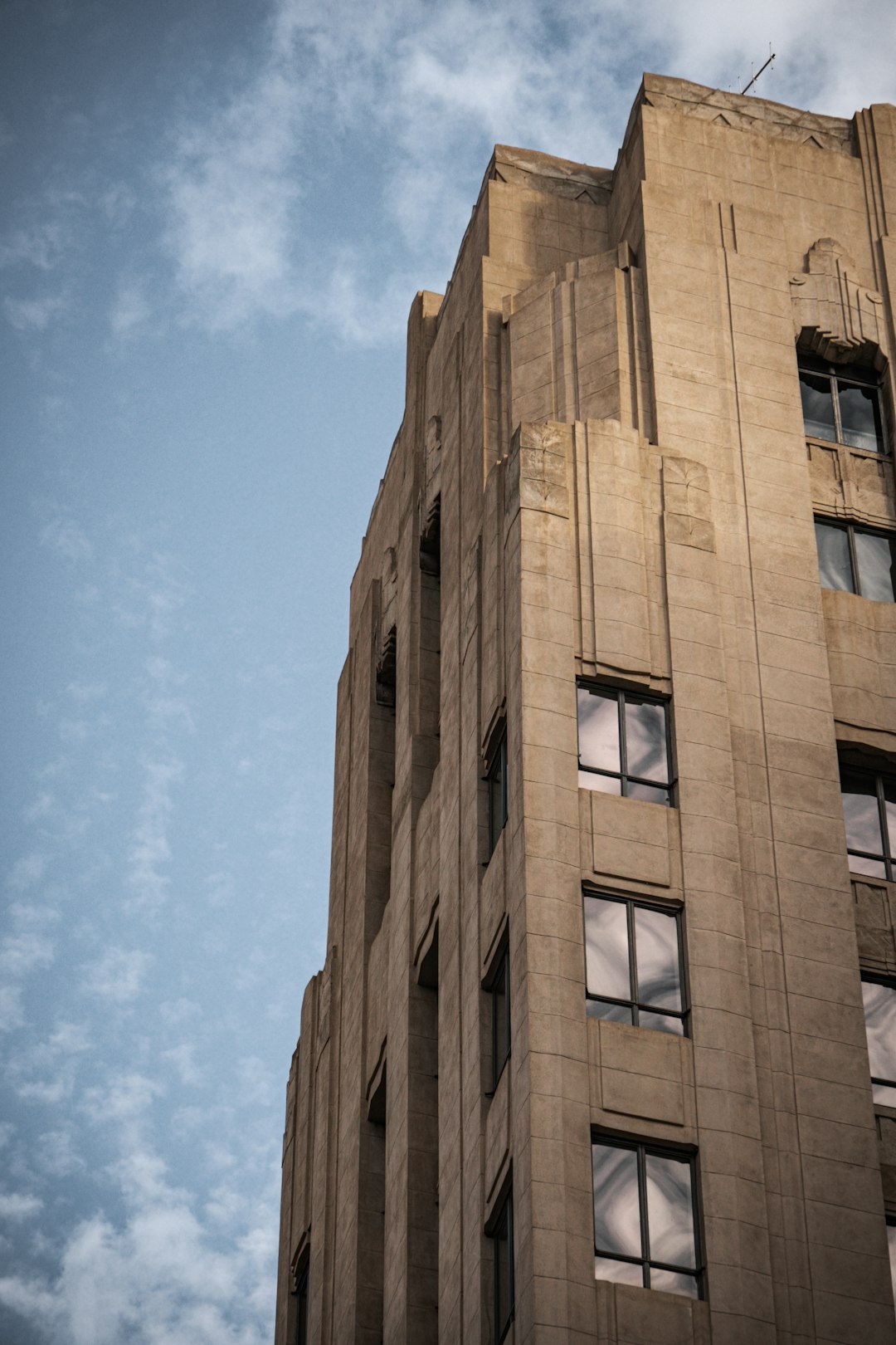 brown concrete building under blue sky during daytime