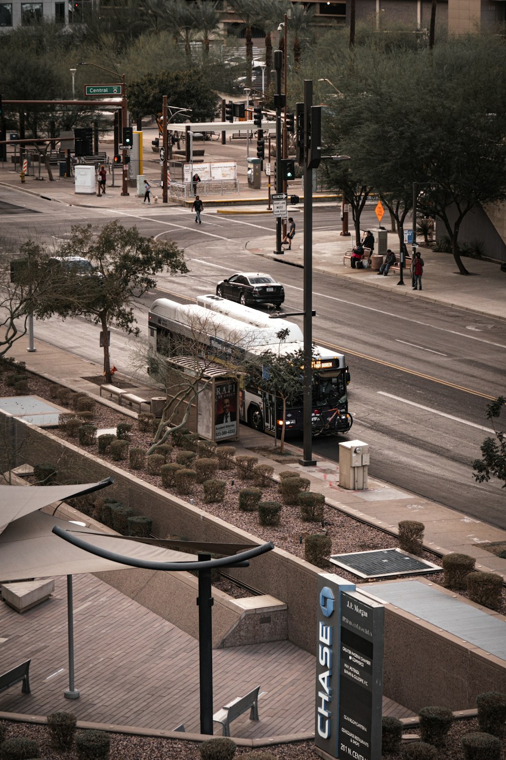 black bus on road during daytime