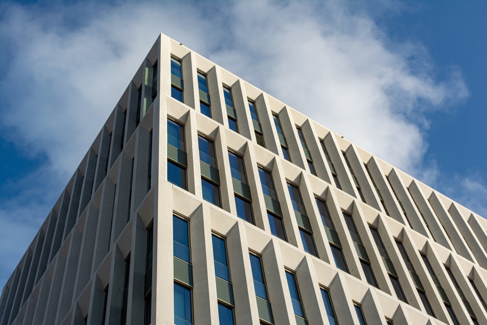 white concrete building under blue sky during daytime