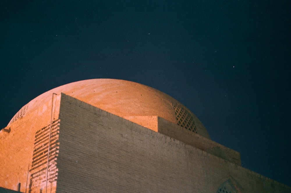 brown concrete building during nighttime