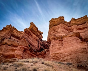 brown rock formation under blue sky during daytime