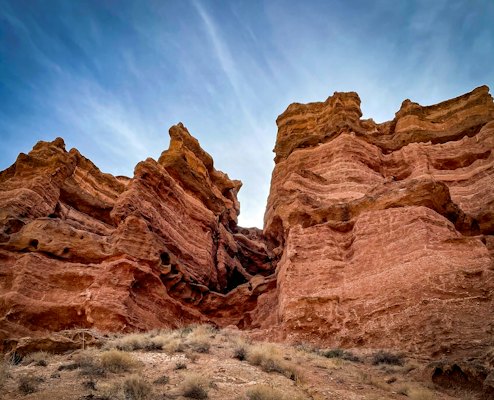 Brown rock formation under blue sky during daytime — Charyn Canyon, Kazakhstan