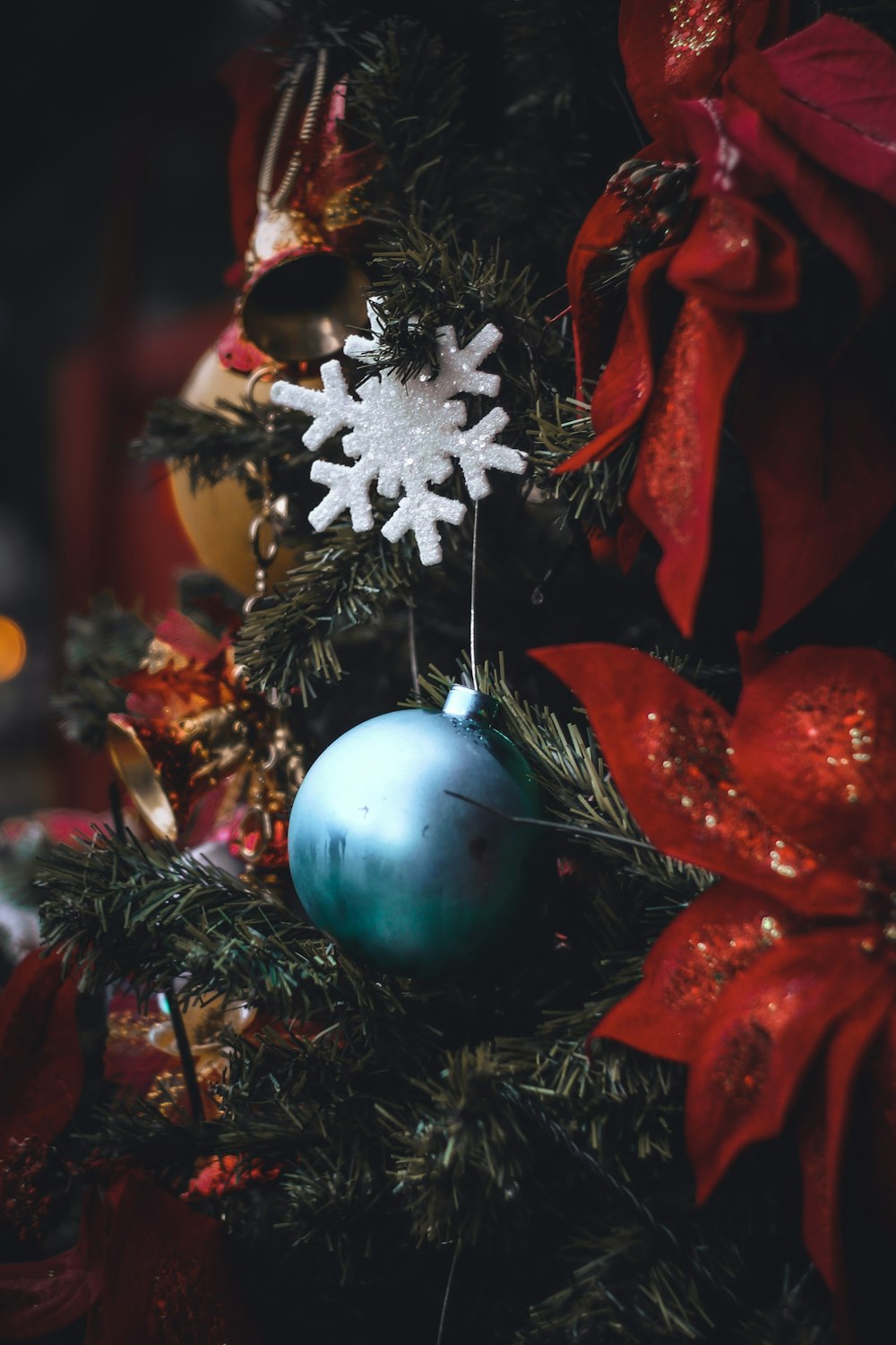 blue baubles on green christmas tree