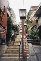 people walking on sidewalk during daytime