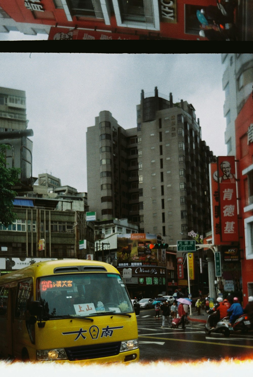 cars on road near buildings during daytime