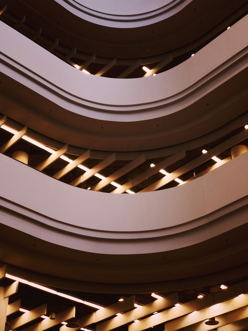 white and brown spiral staircase