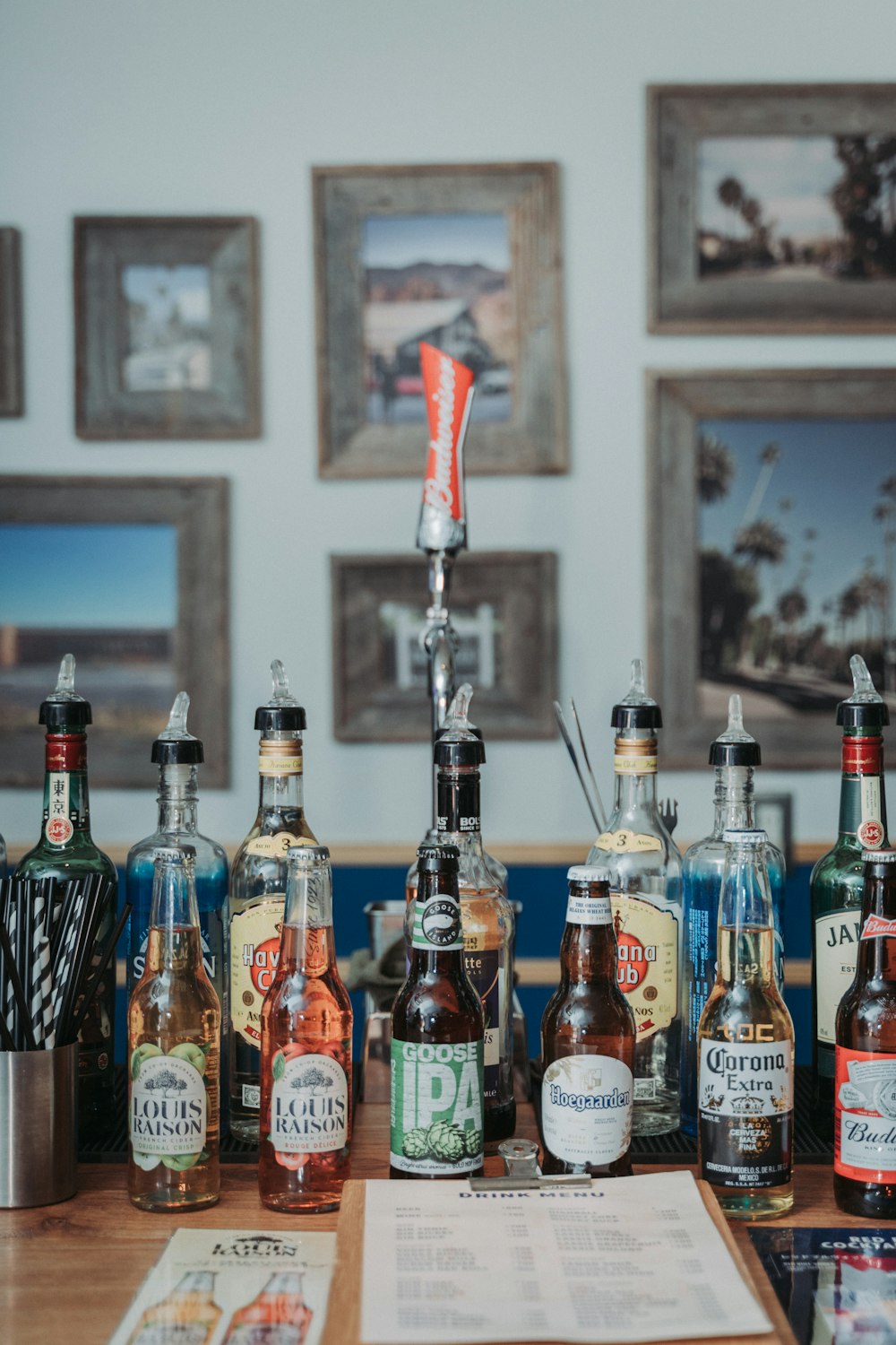 assorted glass bottles on table