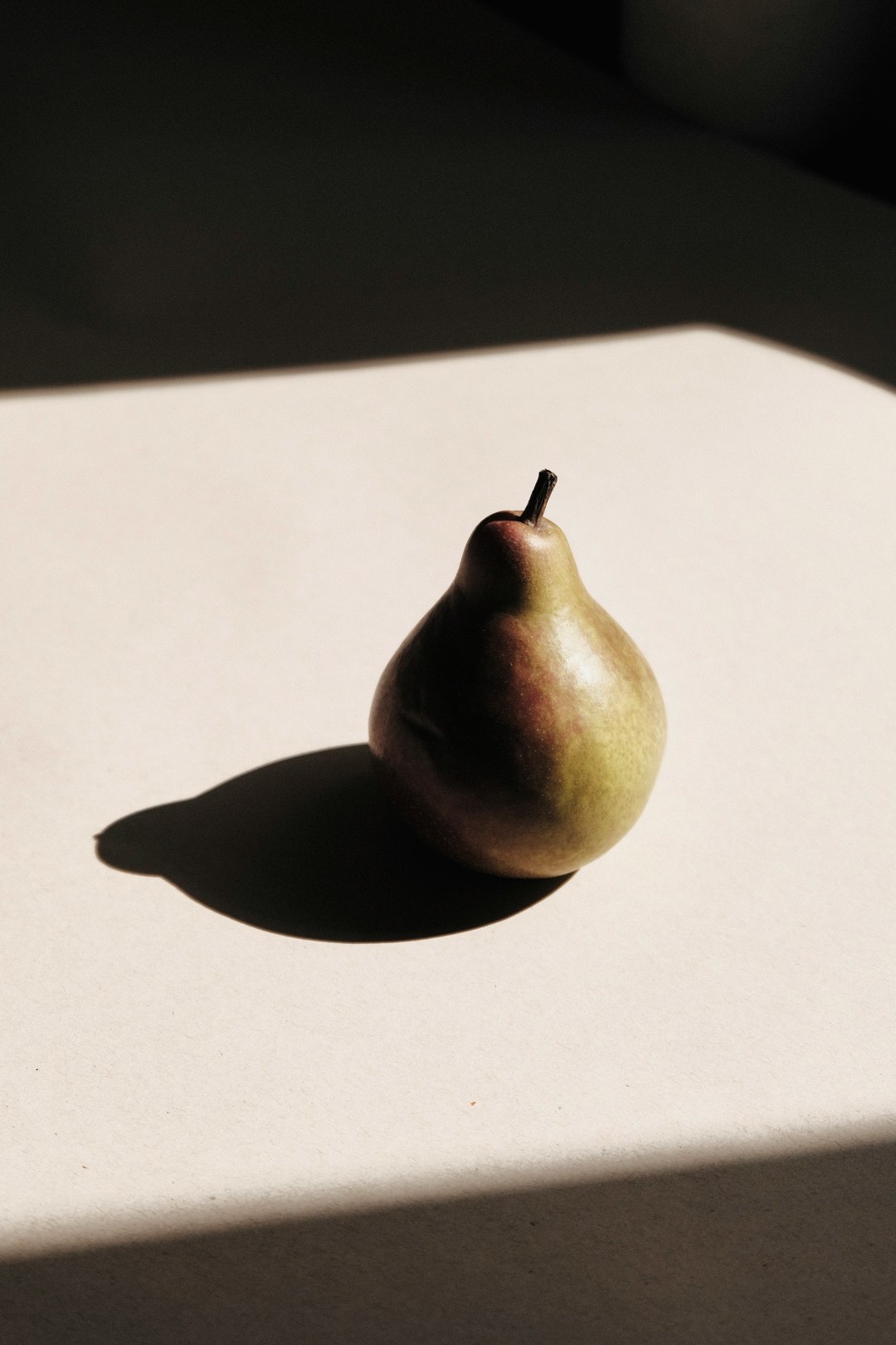 brown fruit on white table
