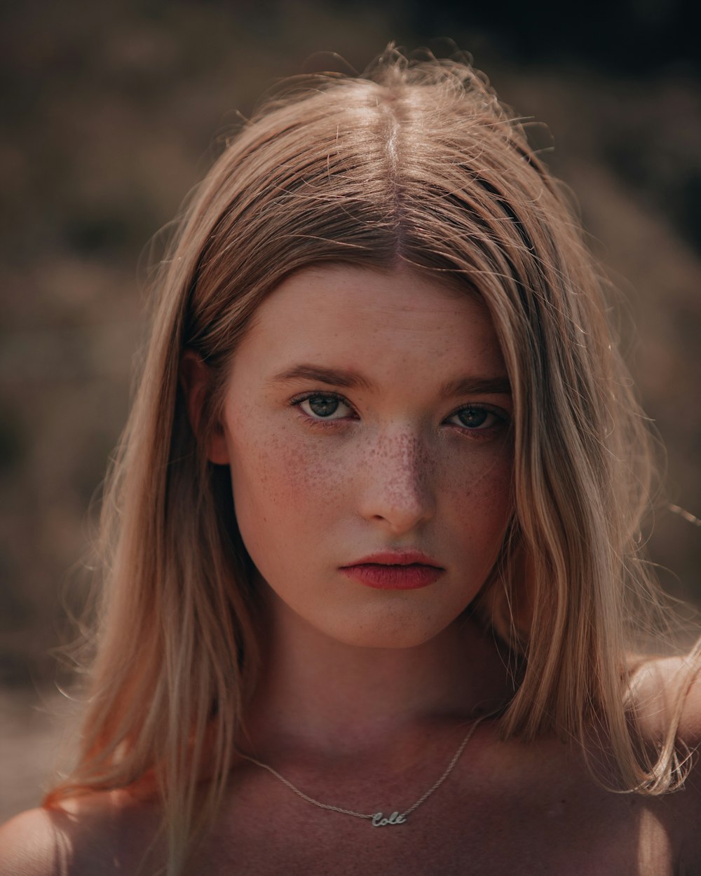 woman with blonde hair in close up photography