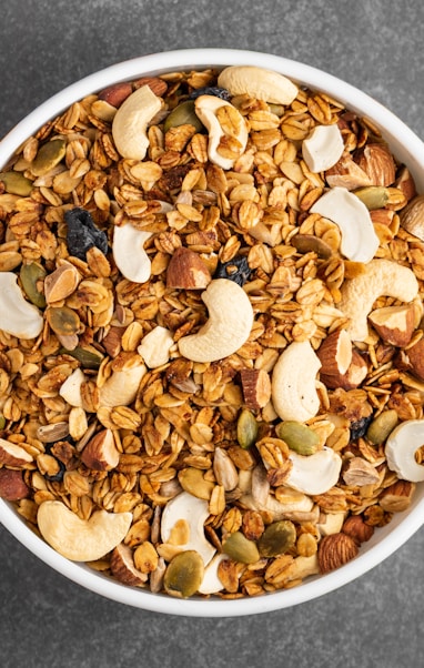 white ceramic bowl with brown nuts