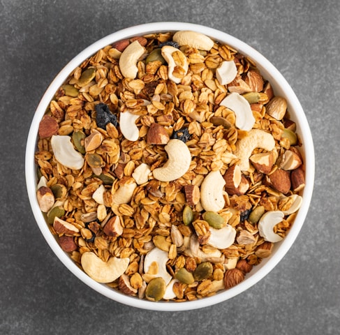 white ceramic bowl with brown nuts