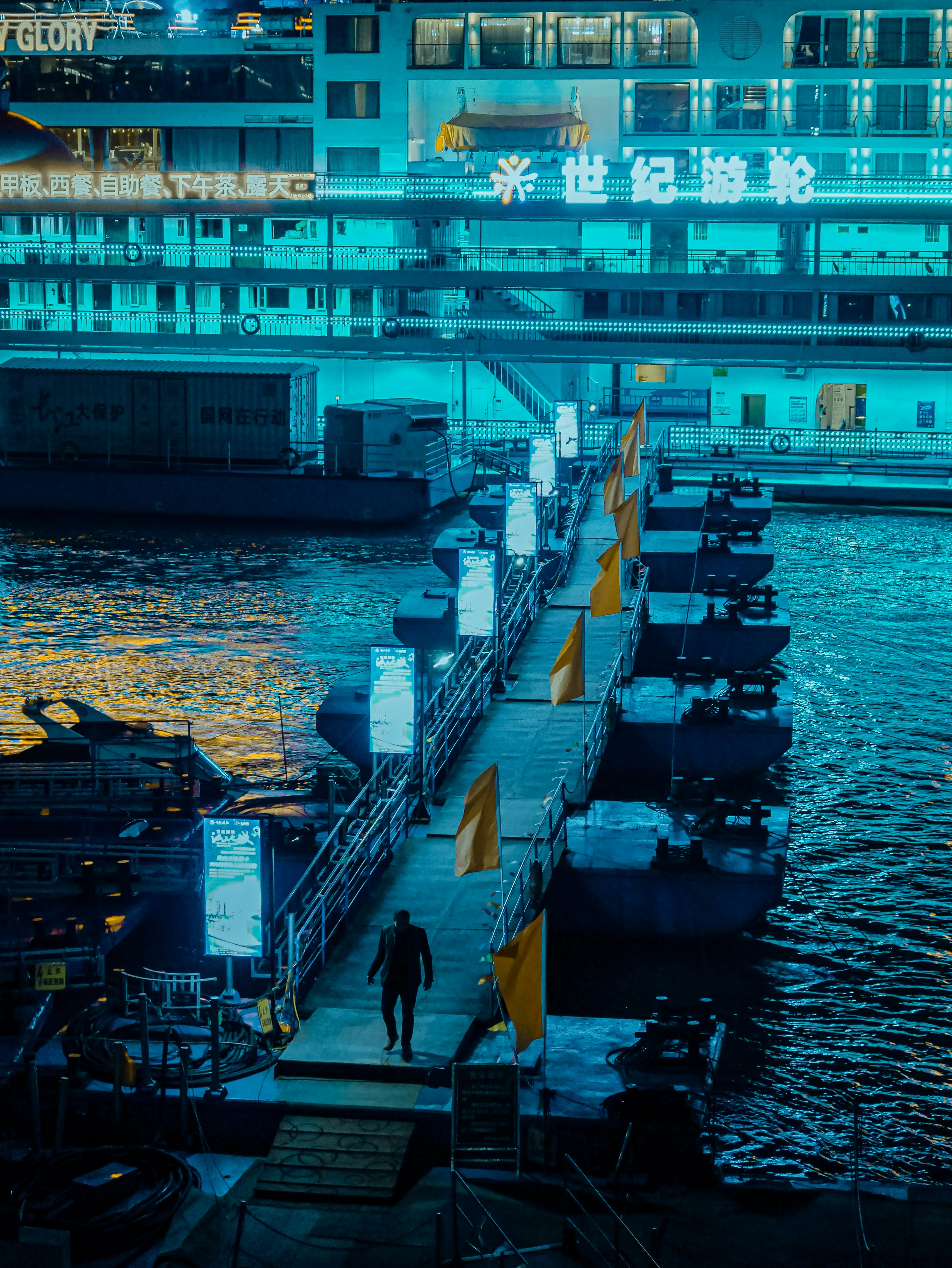 people walking on dock near building during daytime