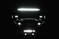 black car on a parking lot
