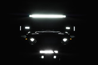 black car on a parking lot