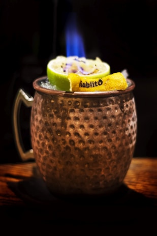 white ceramic mug with green and yellow ice cream