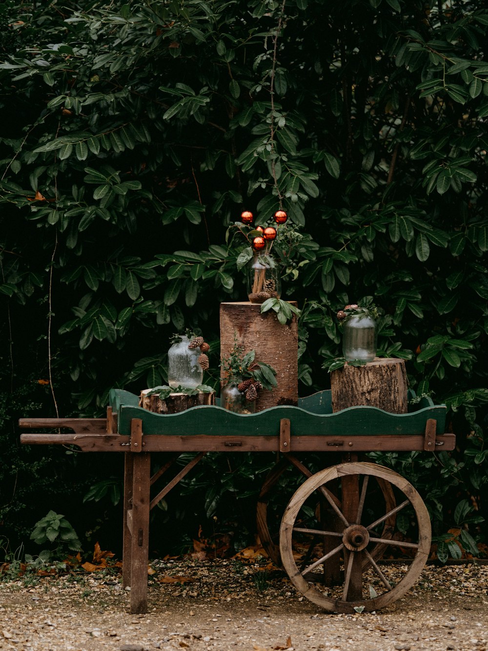 red and brown wooden cart with candle on top