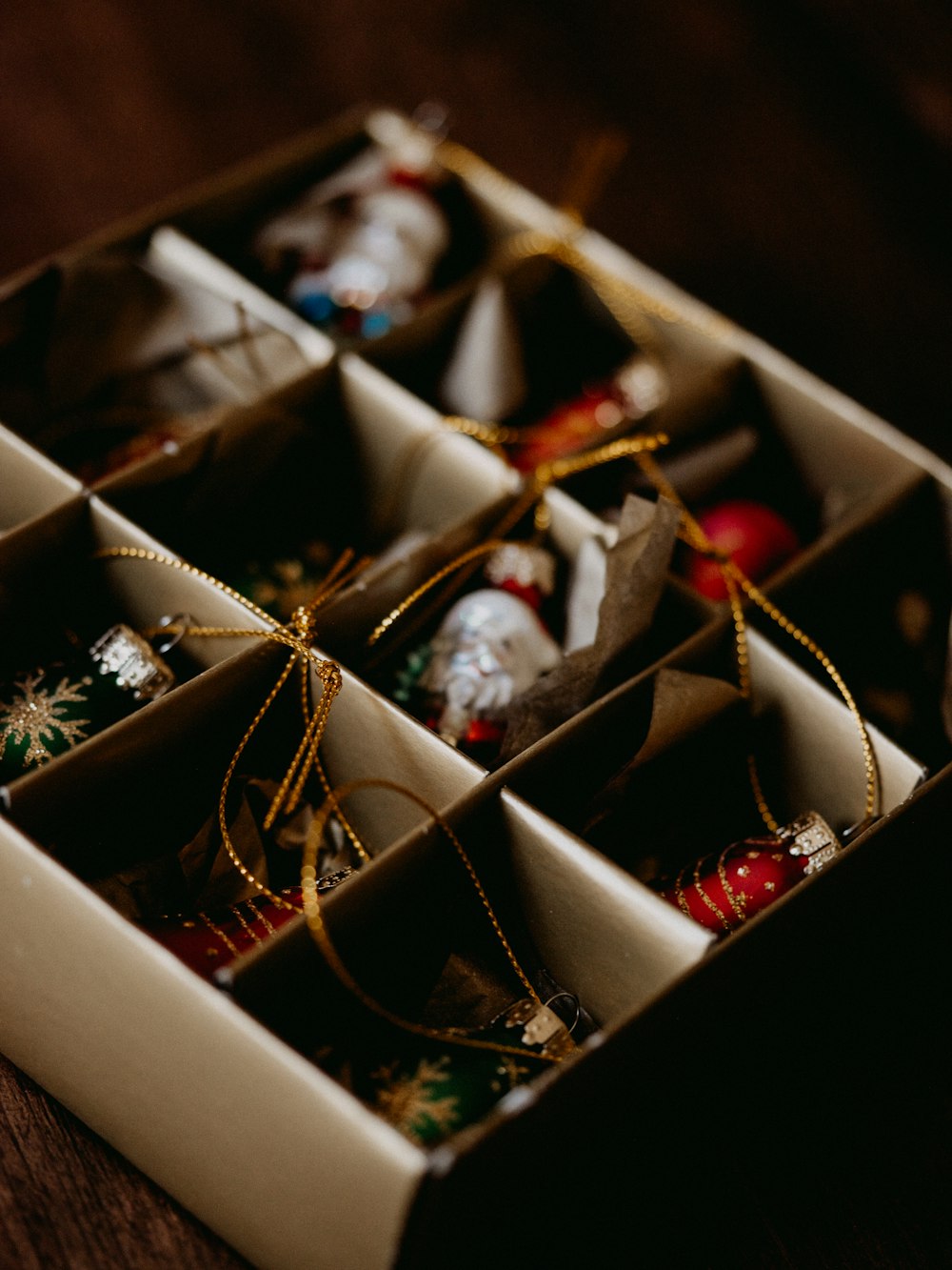 gold and silver baubles in box