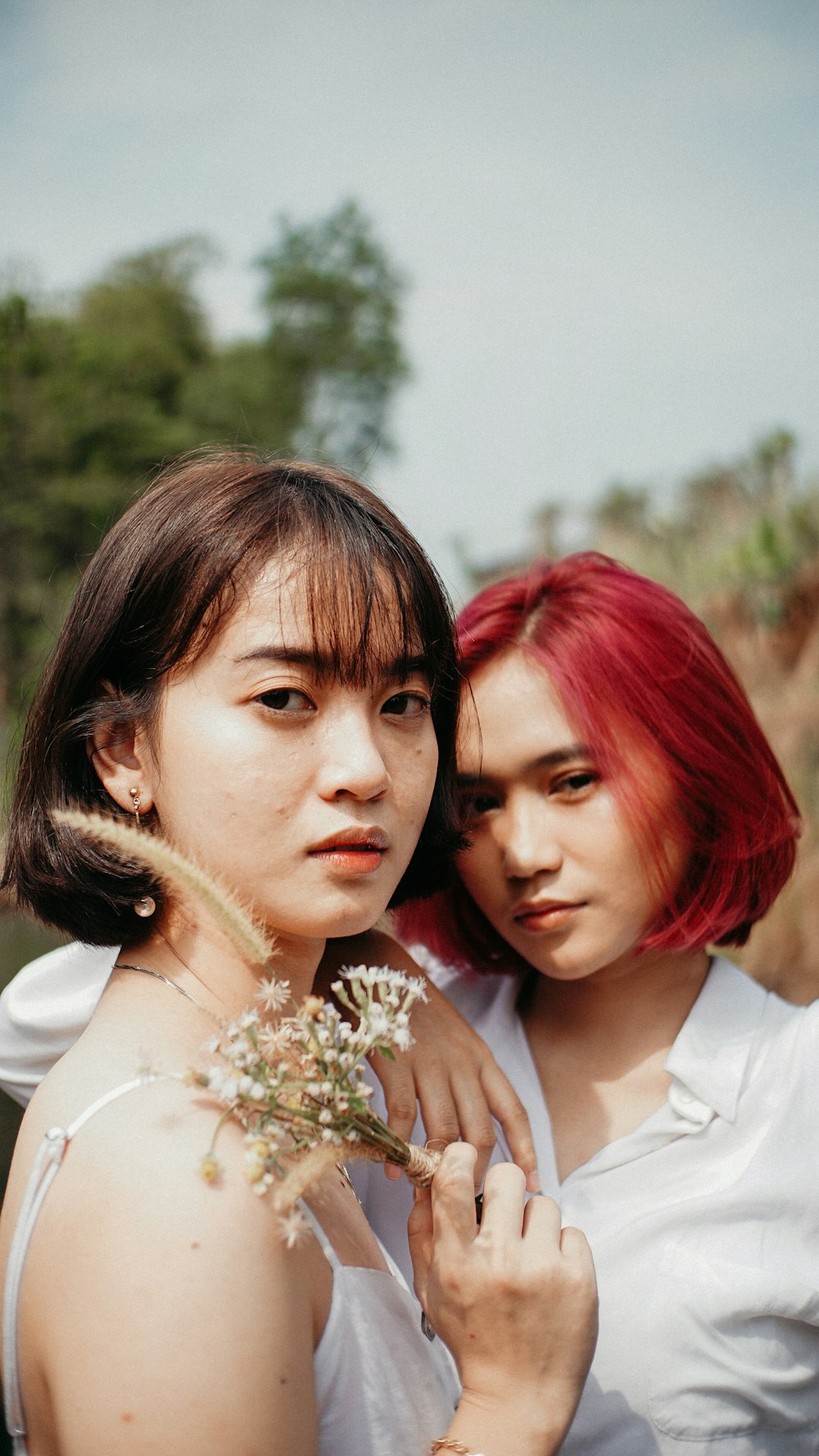 2 women in white dress