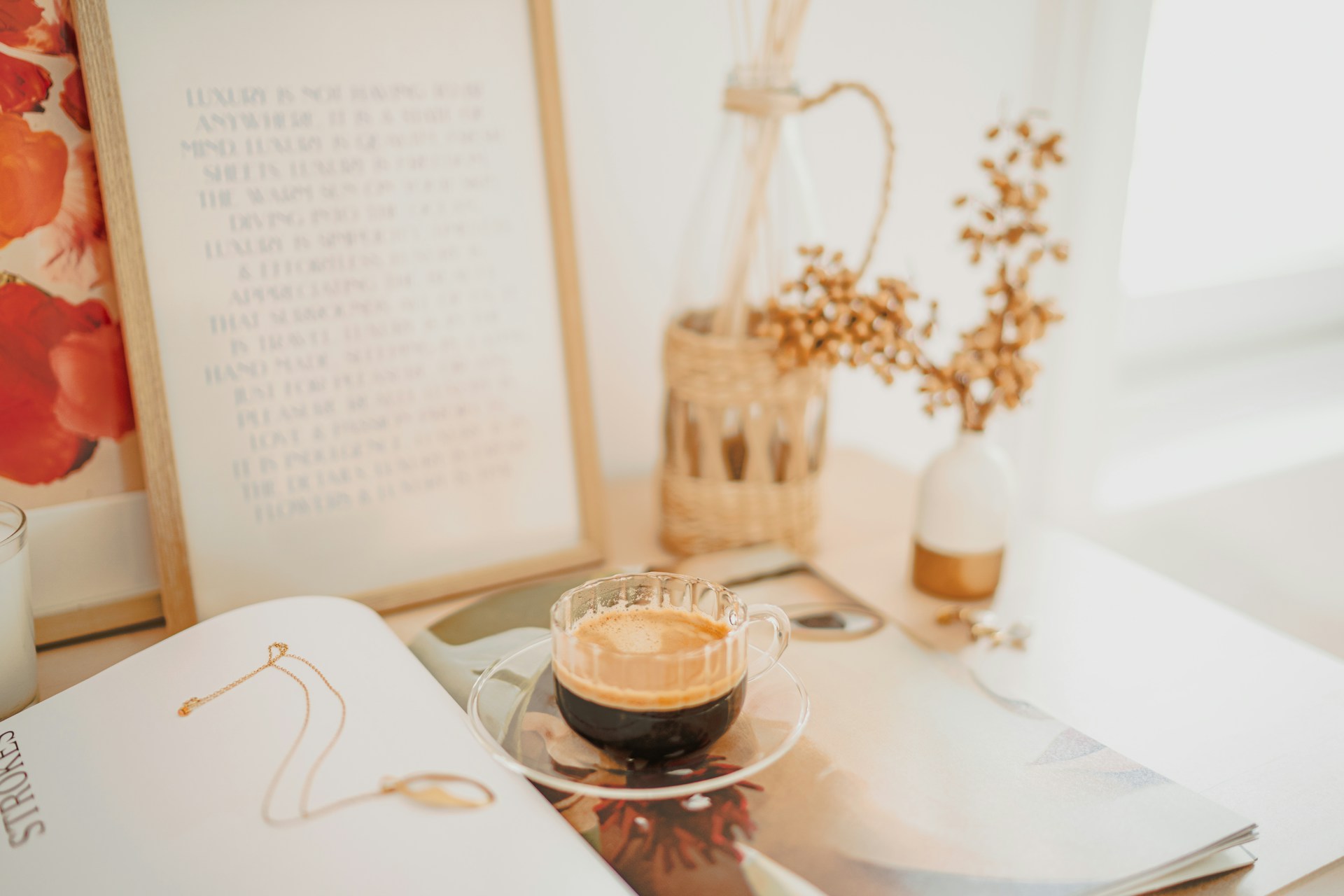 clear glass teacup on white ceramic plate