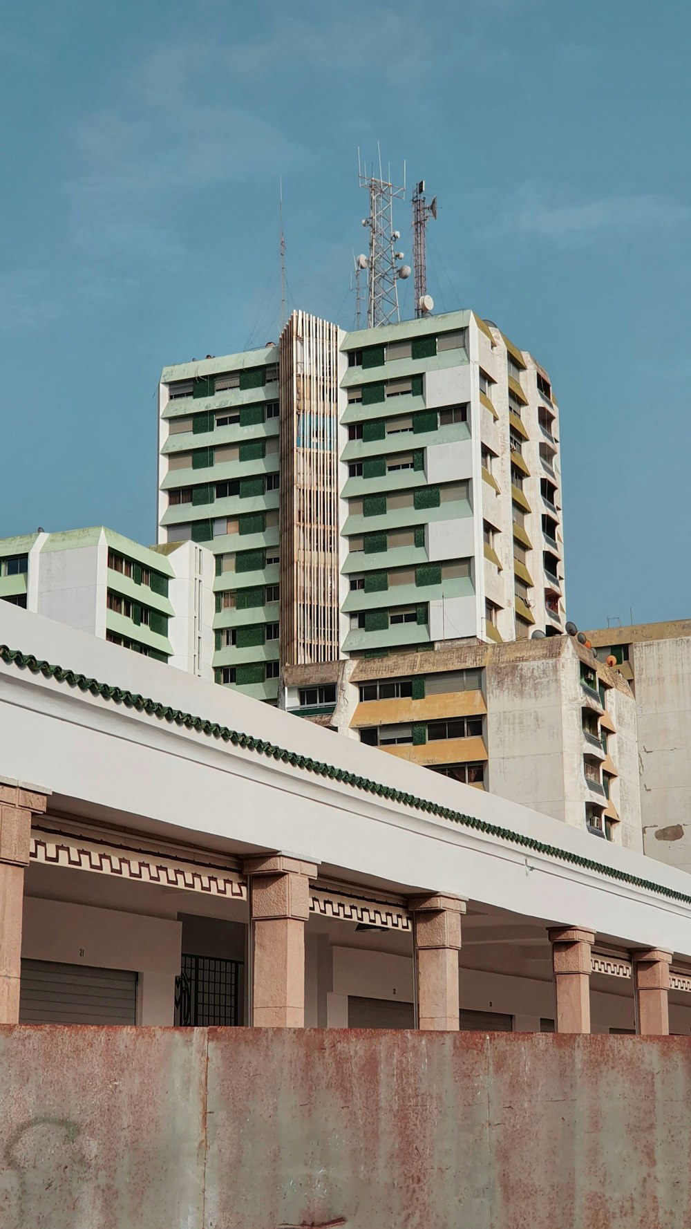 white concrete building under blue sky during daytime