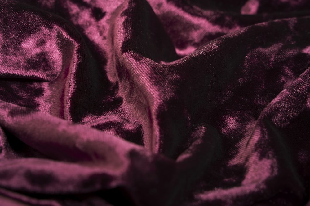 purple textile in close up photography