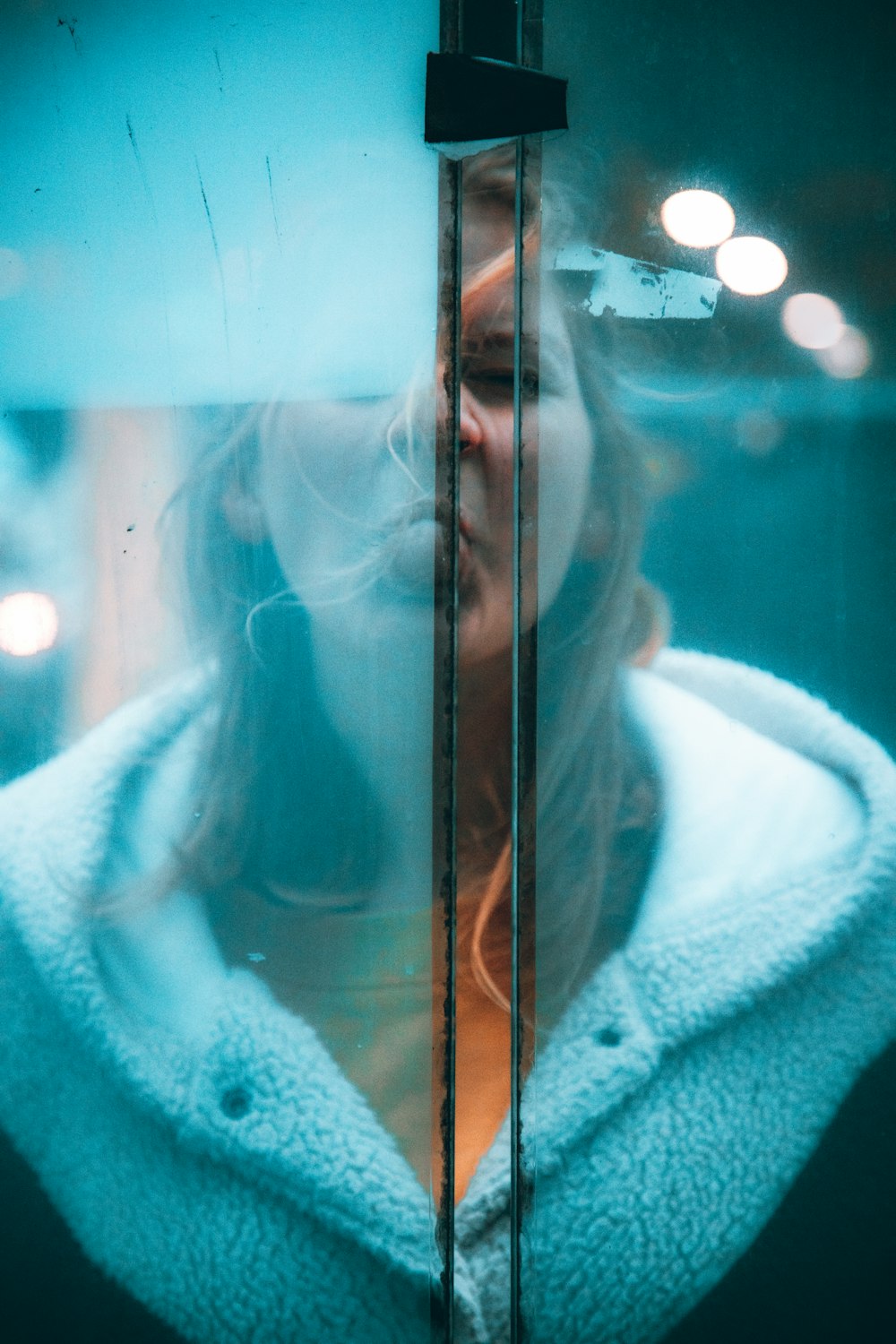 woman in white fur coat