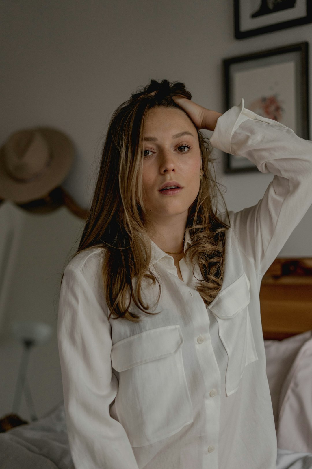 woman in white long sleeve shirt