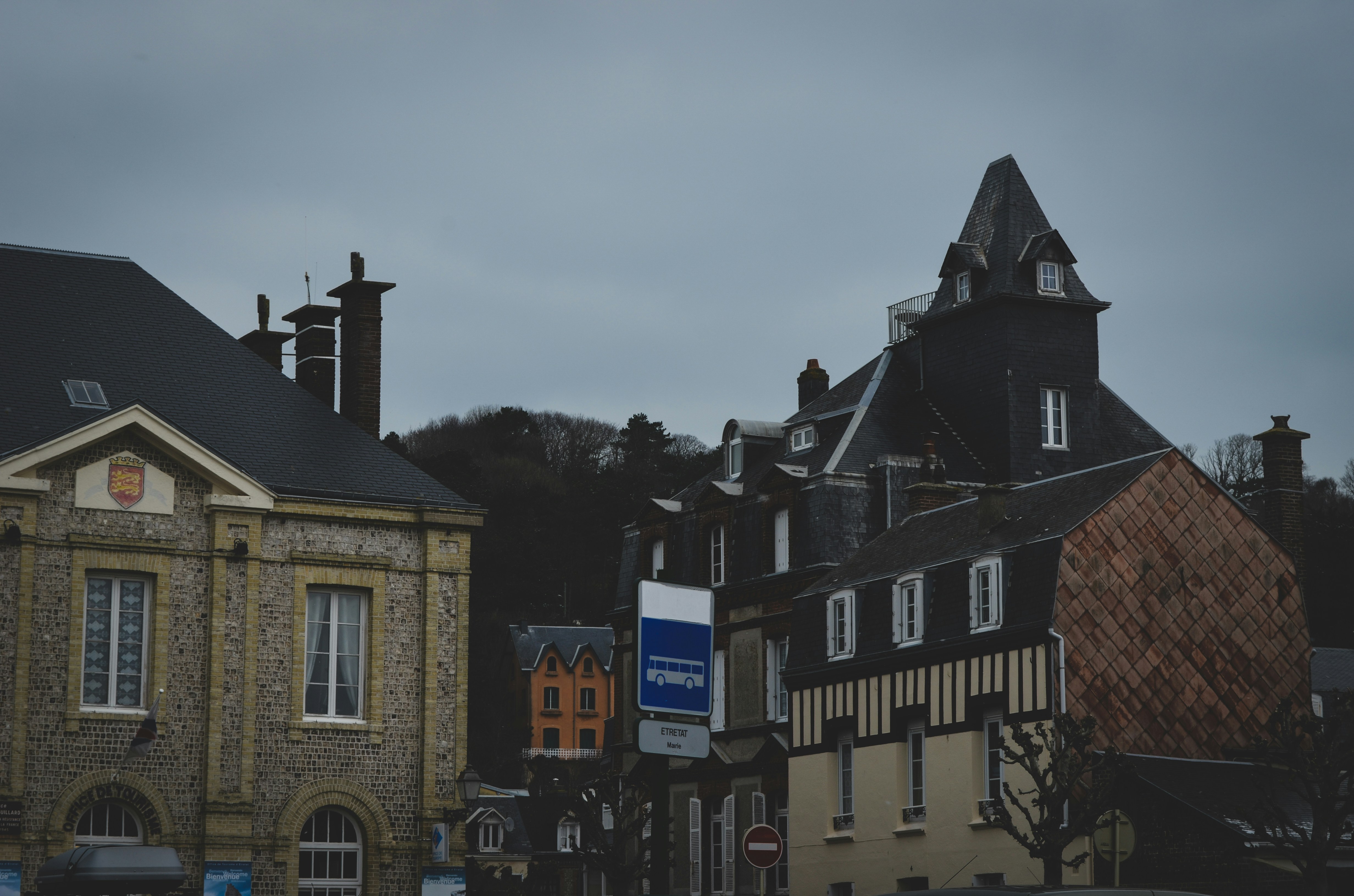 brown and black concrete building during daytime