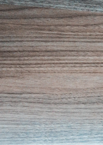 Close-up of rich oak timber panels showcasing natural grain and warm brown hues.