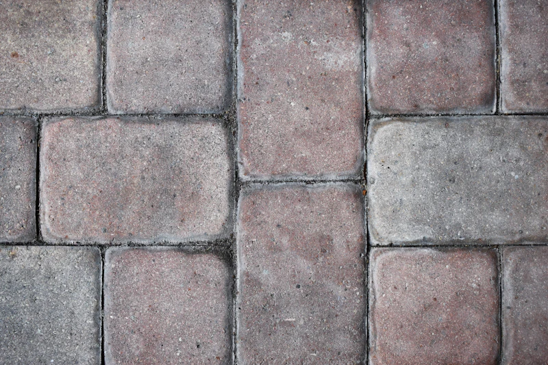 Sunken interlock driveway repair with polymeric sand replacement — Rexdale