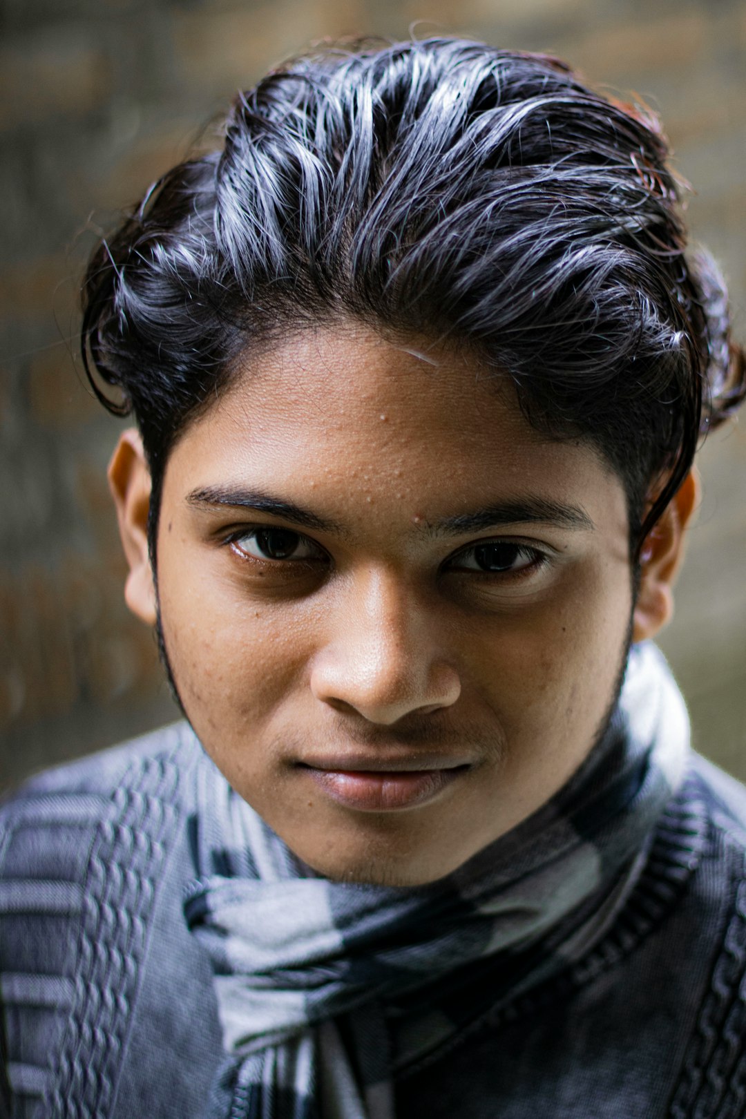 boy in gray and white striped shirt