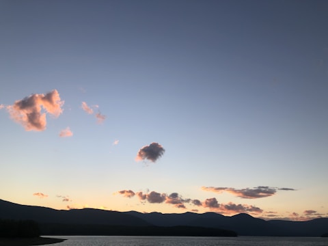 A serene landscape of Lake Rukwa at sunset.