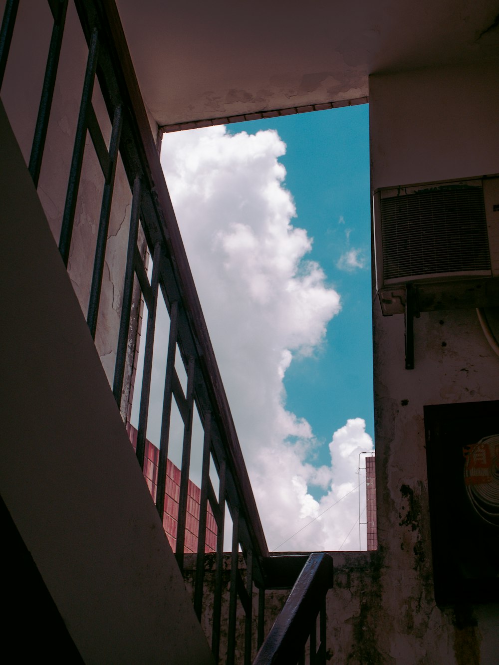 white clouds over the building