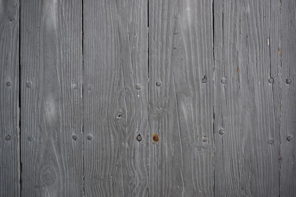 gray wooden plank with hole