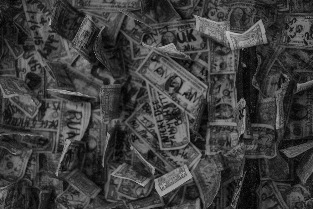black and white photograph of a pile of money