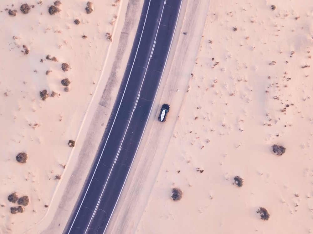 white car on road during daytime