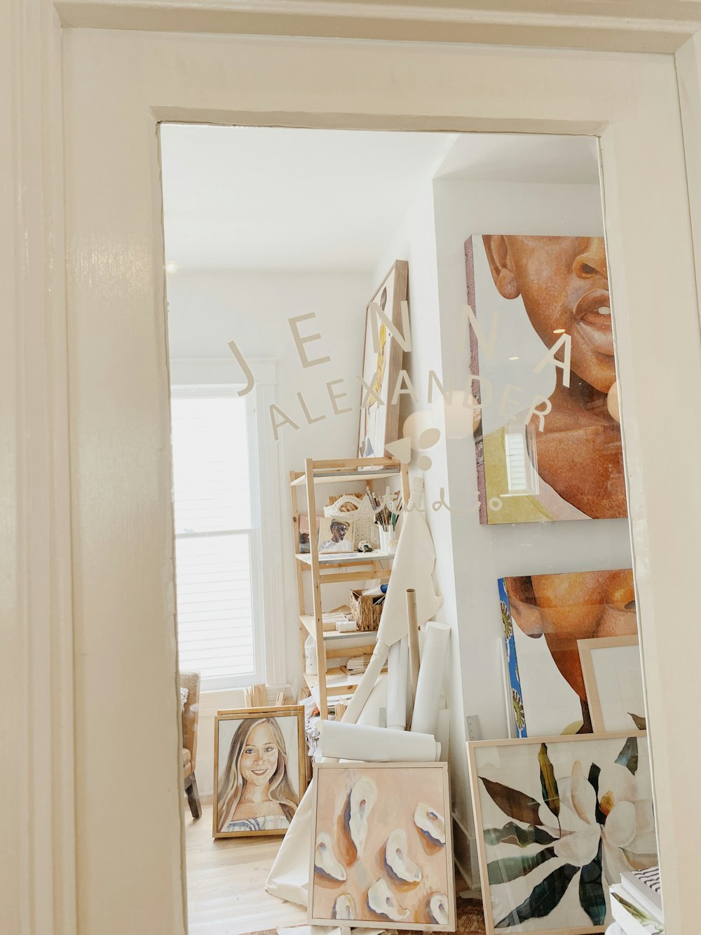 topless man in white underwear standing beside white wall