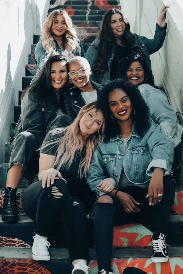 Seven Women sitting and laughing.