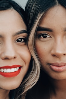 woman with red lipstick smiling