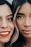 woman with red lipstick smiling