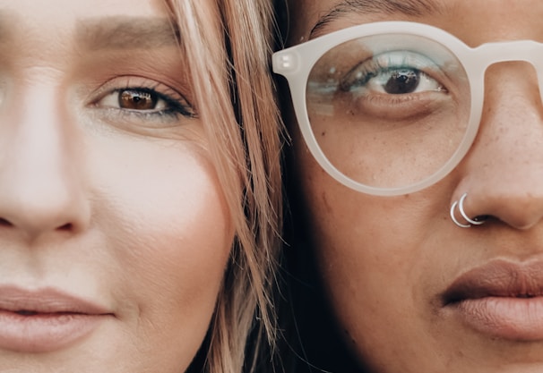 woman wearing white framed eyeglasses