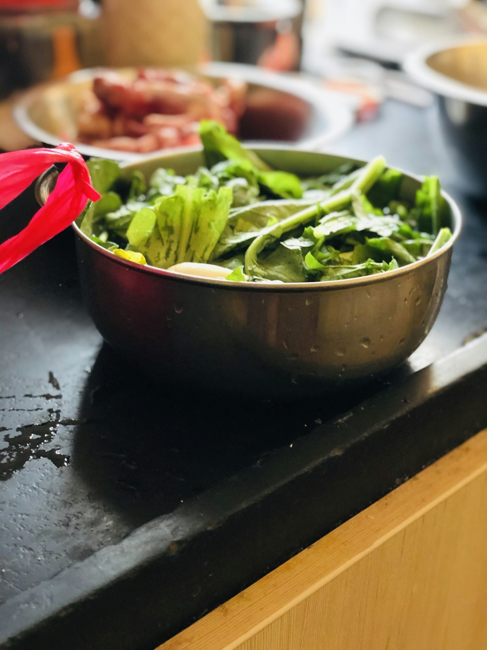 green vegetable in brown ceramic bowl