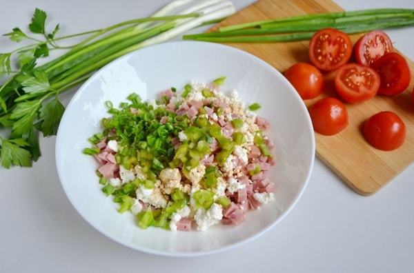Vegetable salad on white ceramic bowl
