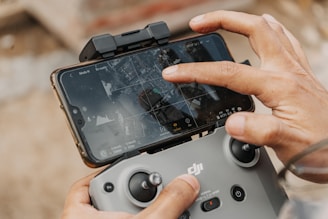 person holding black android smartphone