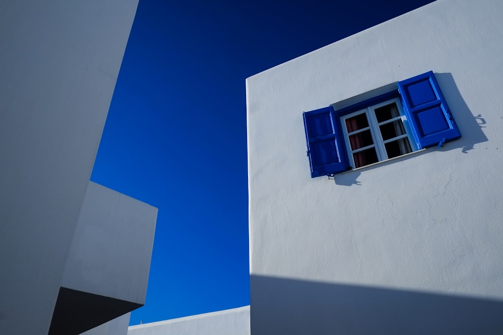 white concrete building under blue sky during daytime