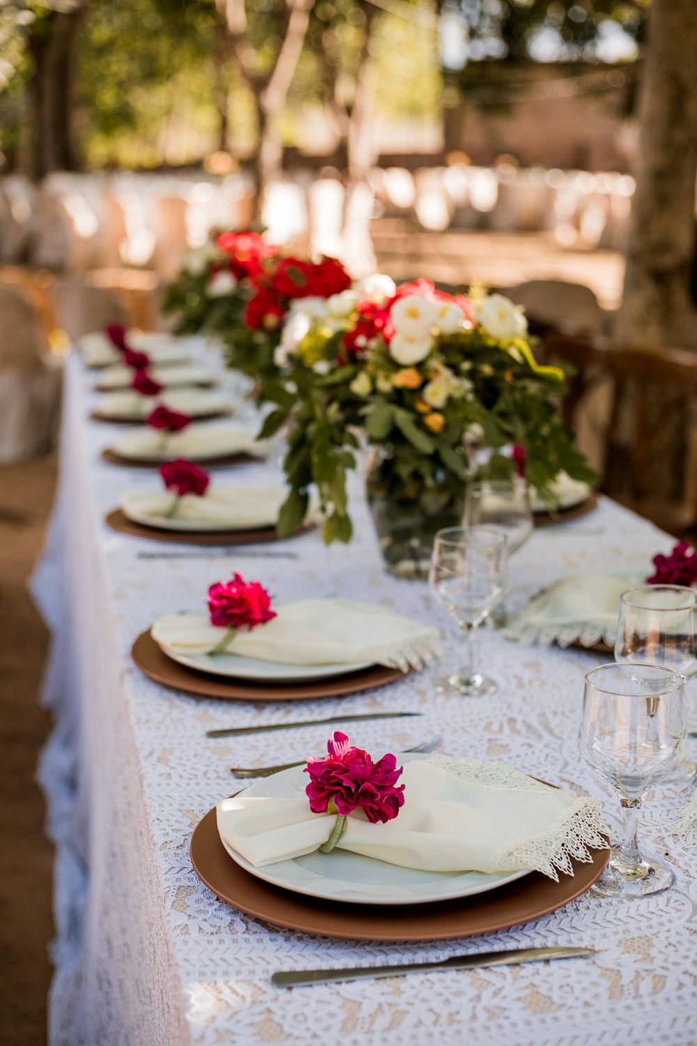 red and white roses on white ceramic plate