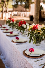 red and white flowers on white ceramic plate