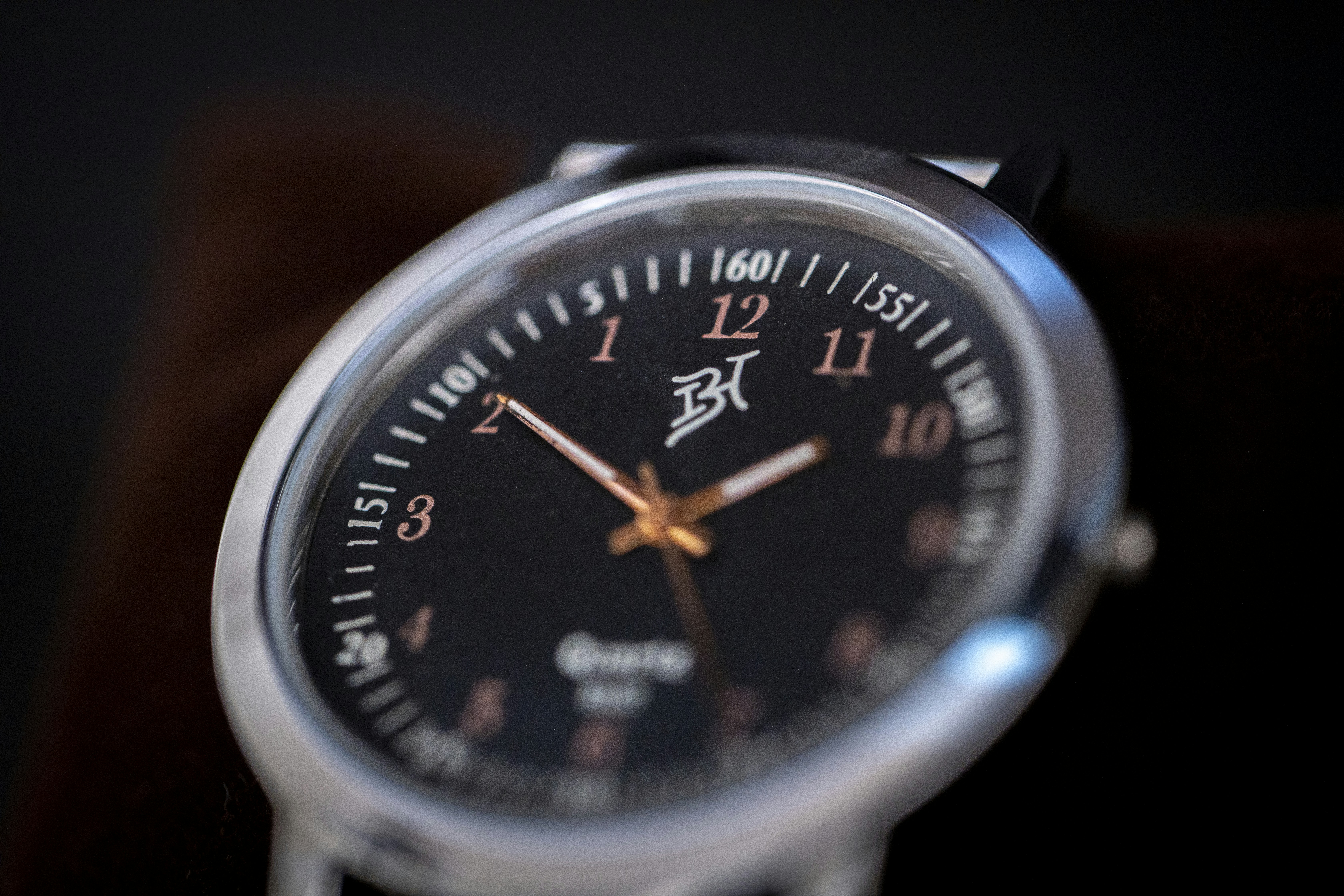 silver and black analog watch