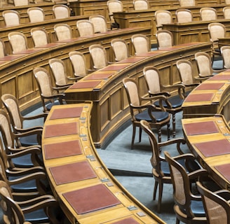 brown wooden chairs on blue and brown wooden floor