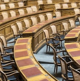 brown wooden chairs on blue and brown wooden floor